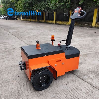 24V बैटरी वोल्टेज इलेक्ट्रिक टो टग आयाम 1300x850x1050mm औद्योगिक टो वाहन भारी शुल्क परिवहन के लिए डिज़ाइन किया गया